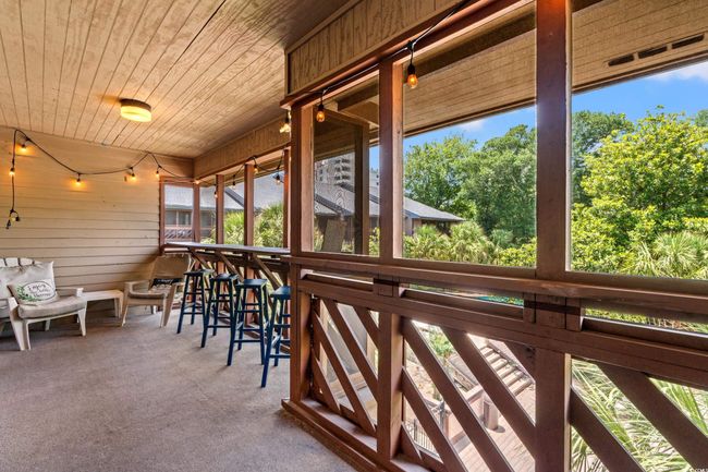 Unfurnished sunroom featuring plenty of natural light | Image 26