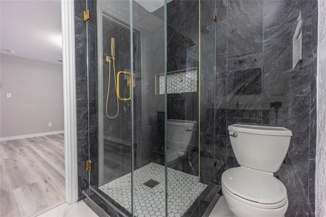 Primary bathroom. | Image 10