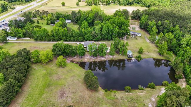 Aerial view of property's location featuring a nearby body of water | Image 38