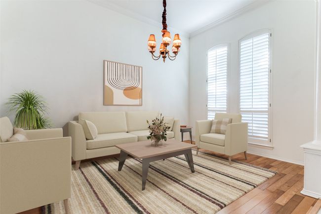 Living area featuring crown molding, light wood-style flooring, a chandelier, and baseboards | Image 8