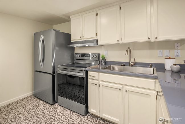 A second kitchen sure comes in handy for a second living situation or even when throwing a big party. Not pictured to the opposite of the refrigerator is a full-size washer and dryer ... the 2nd laundry in the house. | Image 26