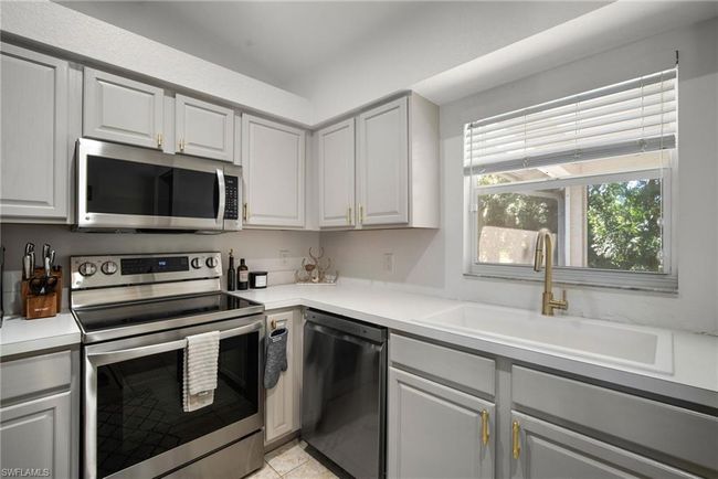 23485 Olde Meadowbrook Cir, House other with 3 bedrooms, 2 bathrooms and 2 parking in ESTERO FL | Image 17