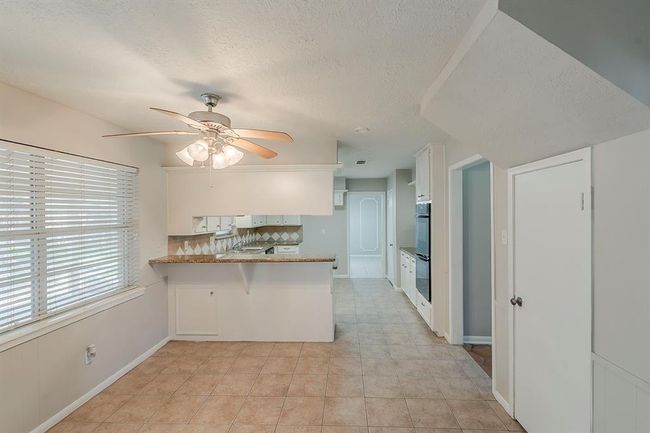 7803 Hurst Forest Dr, House other with 4 bedrooms, 3 bathrooms and 2 parking in Humble TX | Image 10