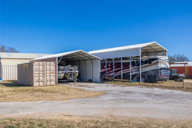 View of outbuilding with a carport | Image 16