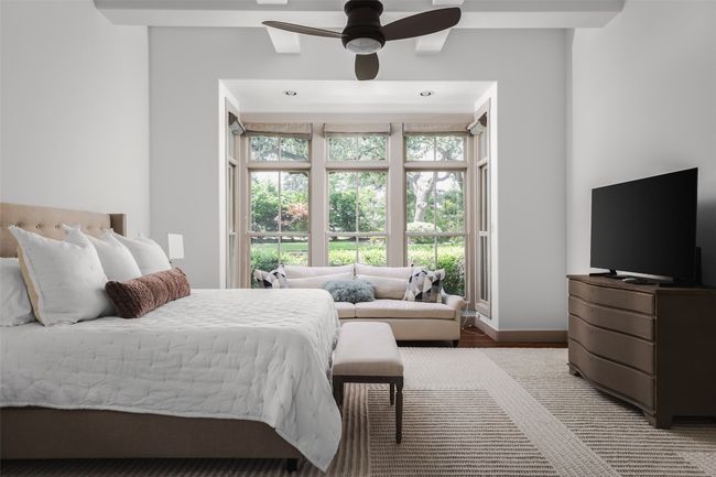 View to the garden like back yard from the primary bedroom | Image 17
