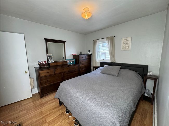 First floor bedroom featuring light wood-style floors | Image 17