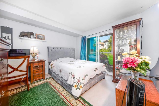 Bedroom with access to exterior | Image 25