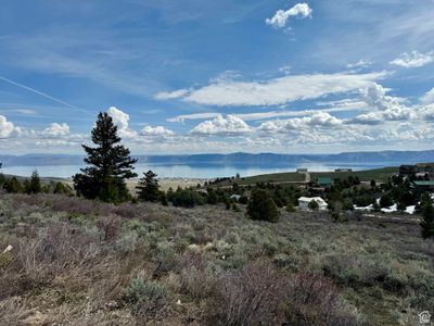 View of mountain feature with a water view | Image 1