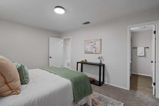 Bedroom featuring carpet and baseboards | Image 13