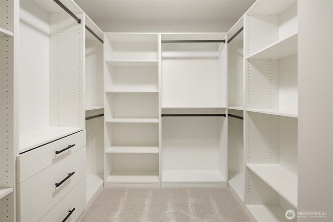 Generous walk-in closet for effortless organization. | Image 30