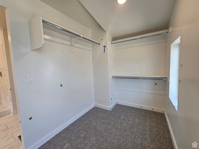 Walk in closet with carpet floors | Image 20