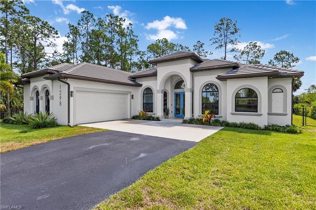 1298 23rd St Sw, House other with 3 bedrooms, 2 bathrooms and null parking in Naples FL | Image 1