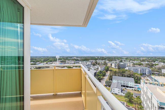 Balcony with a view of city | Image 19