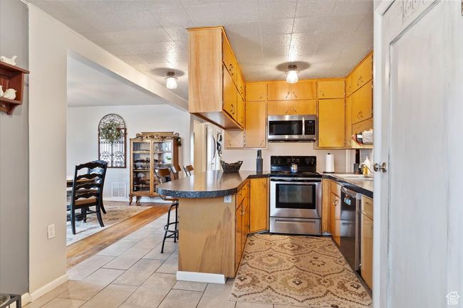 673 E 1000 S, House other with 4 bedrooms, 2 bathrooms and 3 parking in Clearfield UT | Image 11