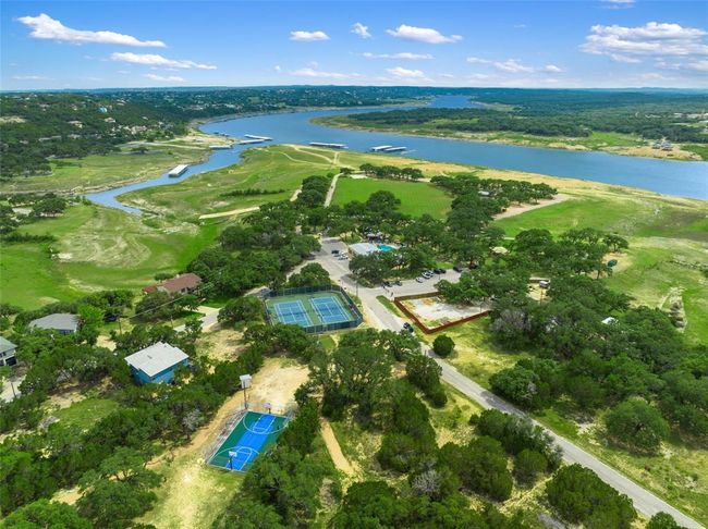 Aerial view of property and surrounding area featuring a large body of water | Image 17