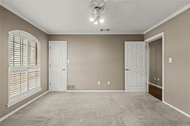 Unfurnished room with carpet flooring and crown molding | Image 19
