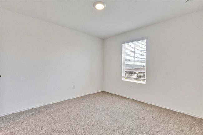 12305 Bulldogger Bnd, House other with 4 bedrooms, 3 bathrooms and 4 parking in Mustang Ridge TX | Image 21