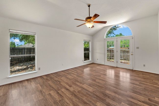 Gorgeous primary bedroom with French doors to the back yard. | Image 18