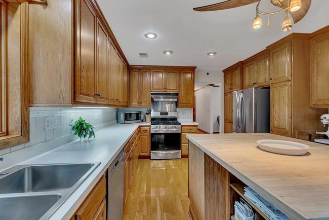 kitchen with ample countertop | Image 7