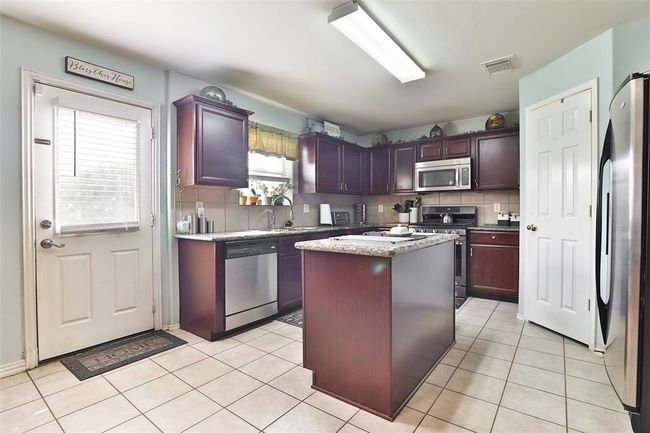 21711 Cascade Hollow Ln, House other with 5 bedrooms, 3 bathrooms and 2 parking in Spring TX | Image 7