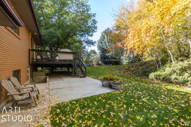 View of patio with stairway and a deck | Image 52