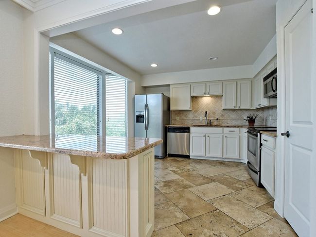 168 World Of Tennis Sq, Condo with 3 bedrooms, 3 bathrooms and 2 parking in Lakeway TX | Image 12
