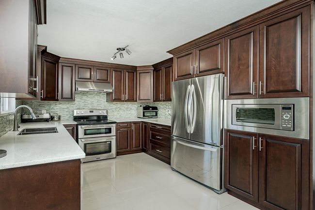 6074 Sherbrooke St, House other with 6 bedrooms, 4 bathrooms and 2 parking in Vancouver BC | Image 8