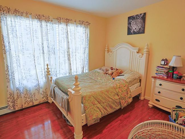 Bedroom featuring wood finished floors | Image 27