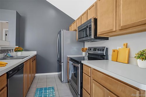 606 Olde English Cir, Howell, MI, 48855-7735 | Card Image