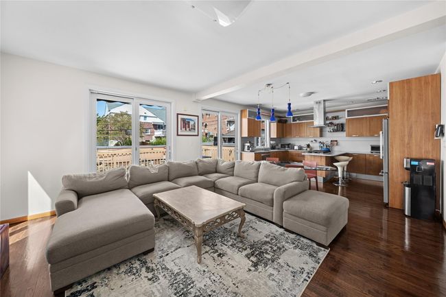 Living room featuring dark wood-style floors | Image 6