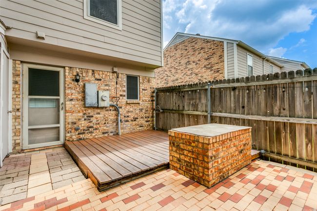 View of patio with a deck | Image 24