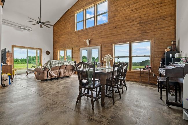 Soaring ceilings in living area | Image 16