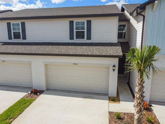 7705 Momentum Parkway Parkway, Townhouse with 3 bedrooms, 2 bathrooms and null parking in Wesley Chapel FL | Image 3