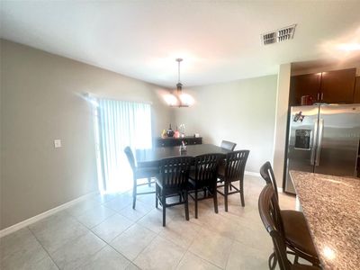 Large open floorplan layout that connects living room and dining room | Image 2