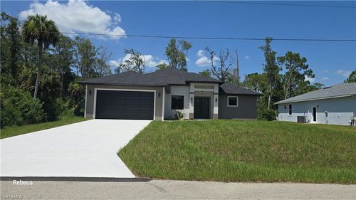 580 Woodview Dr, LEHIGH ACRES, FL, 33972-1086 | Card Image