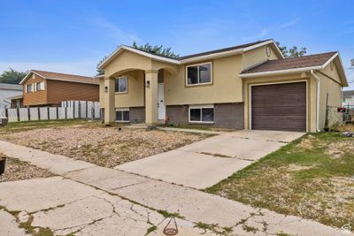 View of front of home featuring a garage | Image 1