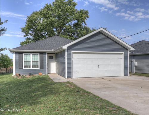 518 S Walnut St, Carterville, MO, 64835-1739 | Card Image