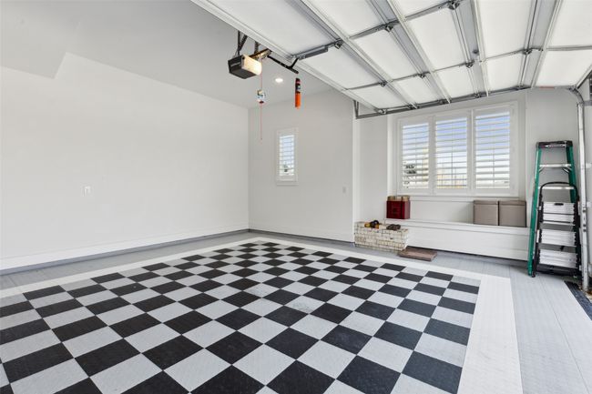 Garage featuring a garage door opener | Image 34