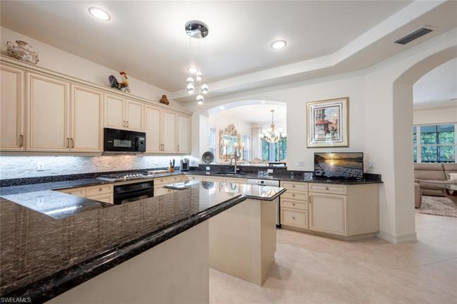 Bright Open kitchen with center island | Image 20