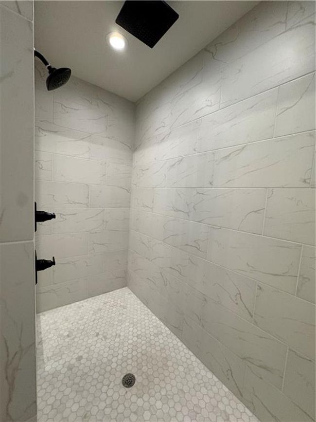 Full bath featuring tiled shower | Image 30
