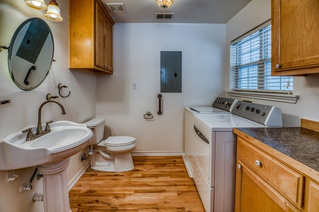 main house half bath/utility room | Image 17