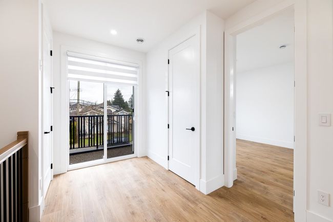 Hall featuring light wood-type flooring and baseboards | Image 25
