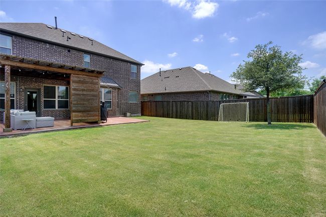 View of yard featuring a patio | Image 23