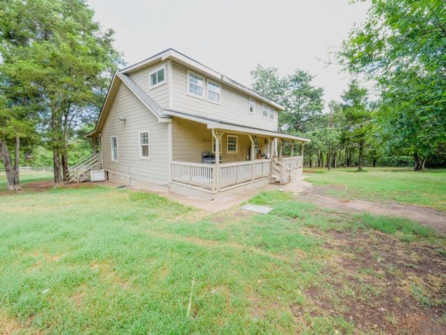 Rear view of property featuring a lawn | Image 29