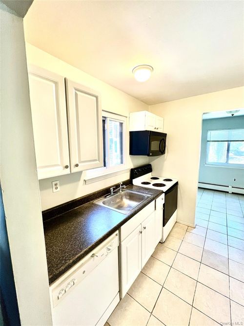 e-1 Heritage Drive, Woodbury, NY, 10926 | Card Image