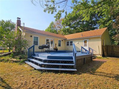 Rear view of property with a huge deck | Image 2