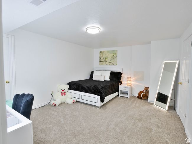 Bedroom with carpet flooring and baseboards | Image 6