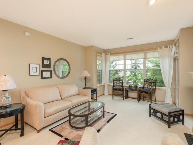 Windows provide natural light and second floor views. | Image 8