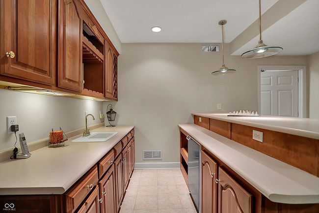 Wet Bar with Mini Fridge. | Image 54