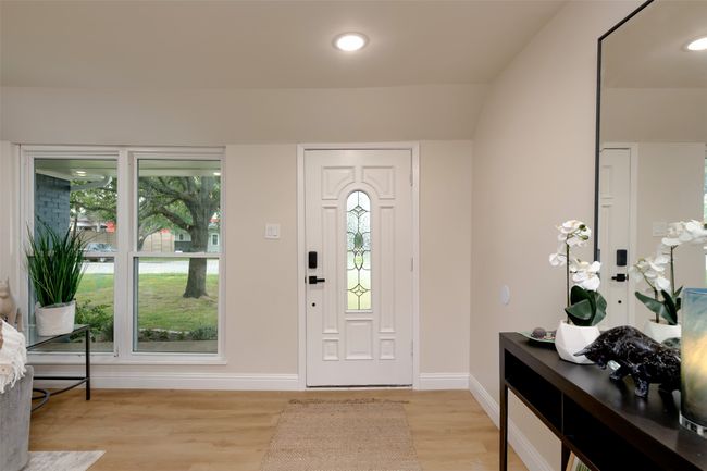 Entryway with healthy amount of natural light, light wood-type flooring, baseboards, and recessed lighting | Image 4
